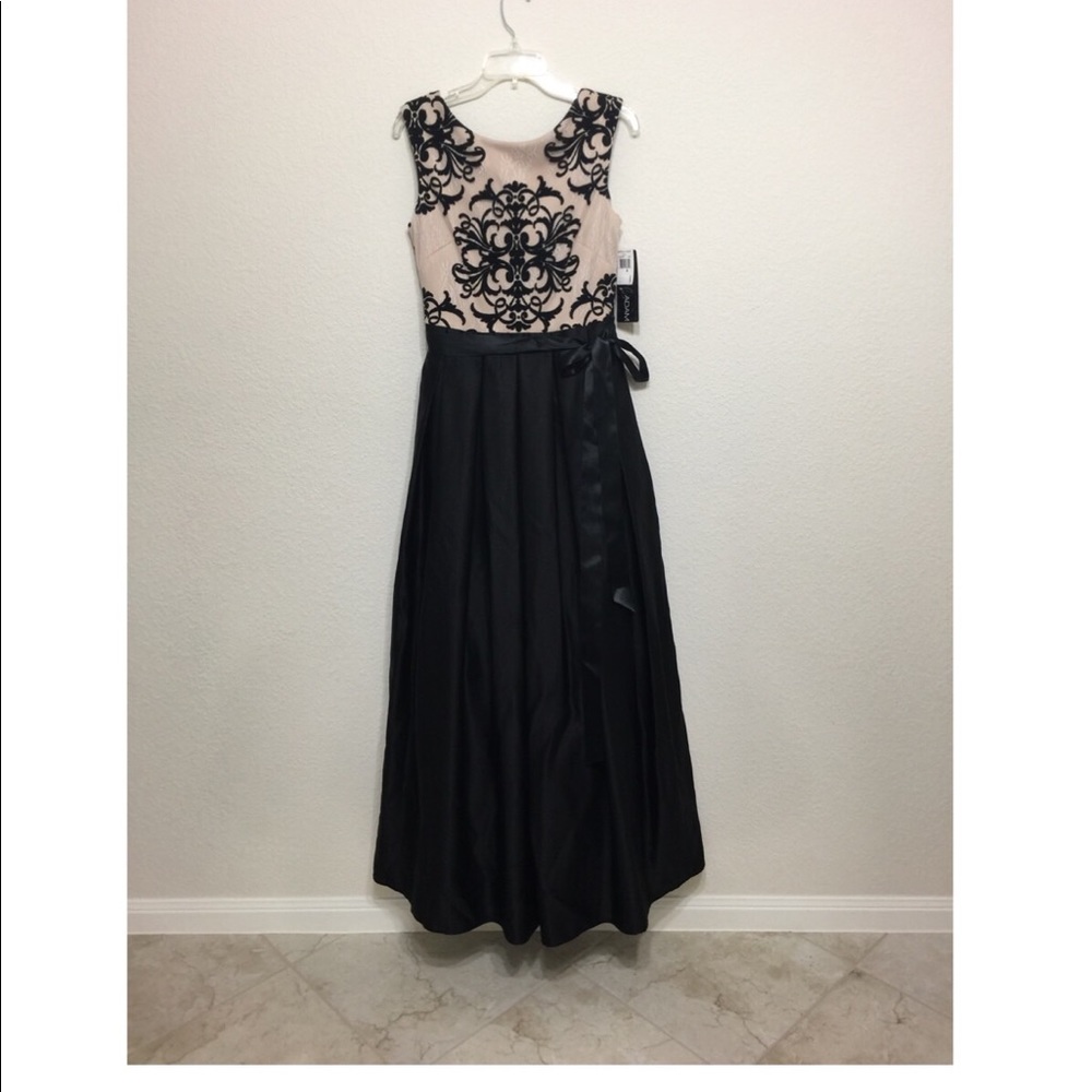 Beautiful gown by Betsy and Adam